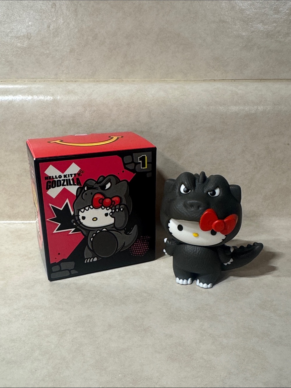 McDonald's Hello Kitty x Godzilla Black Figure with Red Bow